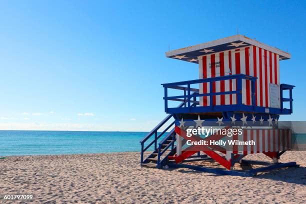 patriotic lifeguard hut on beach - american flag beach stock pictures, royalty-free photos & images