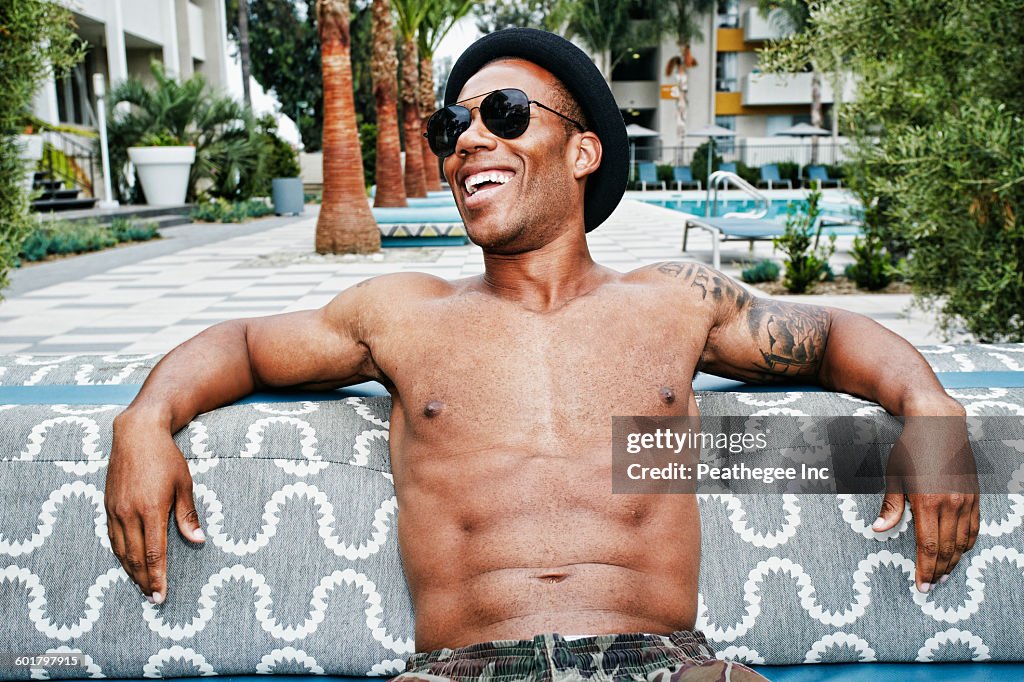 African American man sitting outdoors