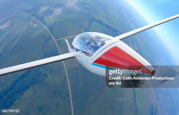 couple flying glider airplane - indian pilot stock-fotos und bilder