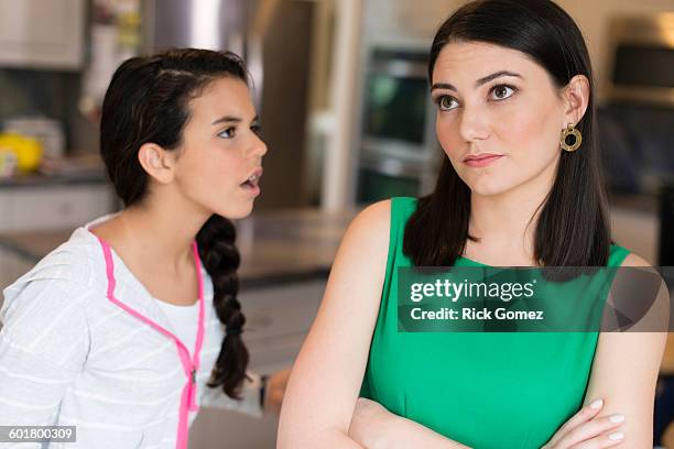 mother and daughter arguing in kitchen - mom shouting stock pictures, royalty-free photos & images