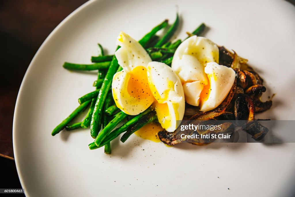 Plate of eggs, mushrooms and vegetables