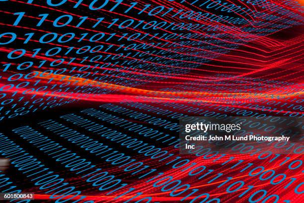 light streaks and binary code - binary code stock illustrations