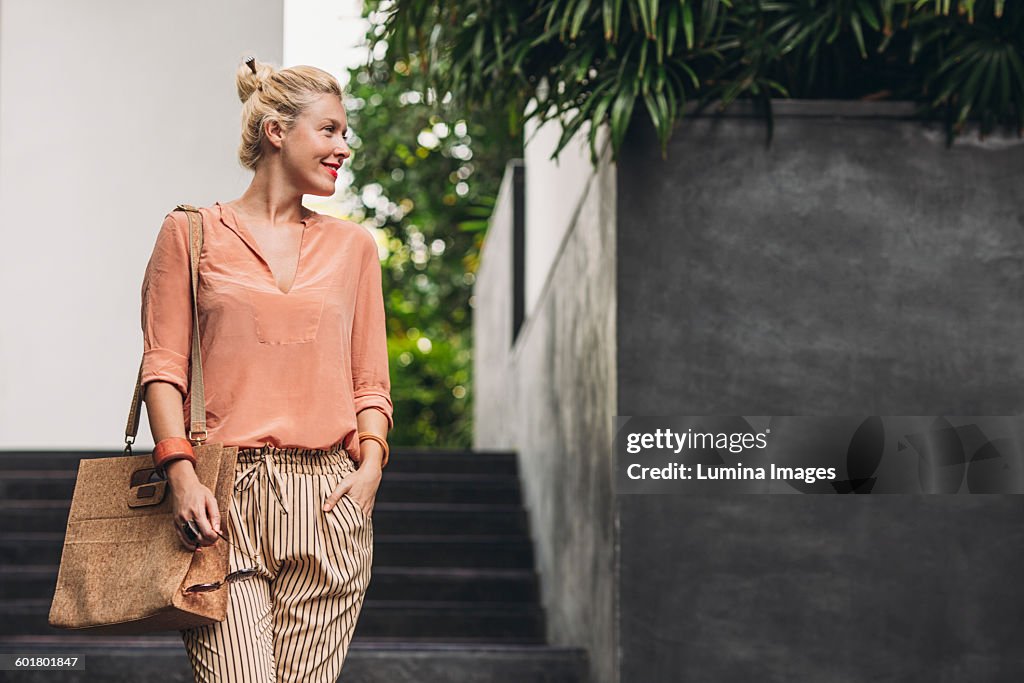 Caucasian woman walking outdoors
