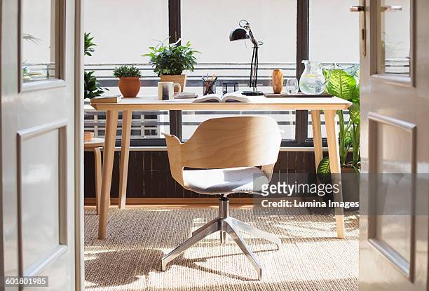 empty chair in home study - office chair stock pictures, royalty-free photos & images