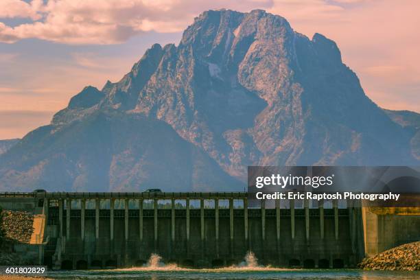 mountain and dam in remote landscape - スネーク川 ストックフォトと画像