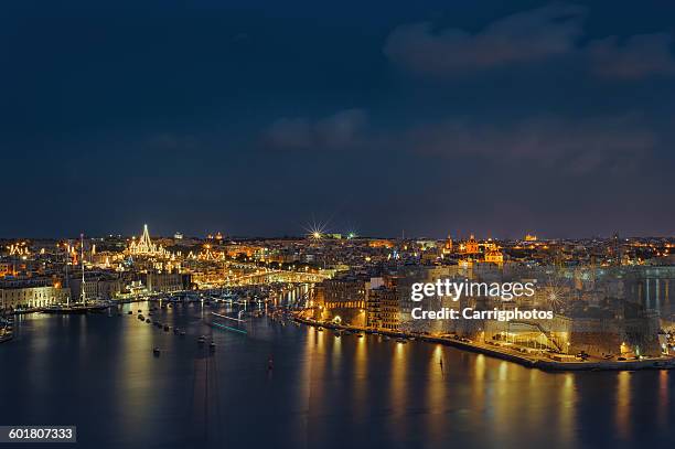 valletta skyline at night, malta - modern malta stock pictures, royalty-free photos & images