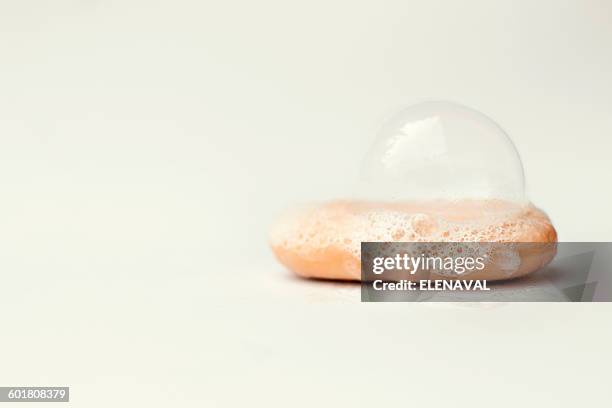 bubbles on a bar of soap - soap bar stock pictures, royalty-free photos & images