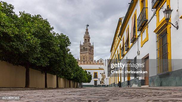 traditional street scene, sevilla, spain - seville stock pictures, royalty-free photos & images