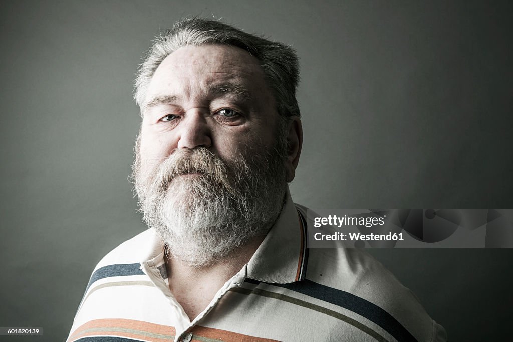 Portrait of senior man with full beard