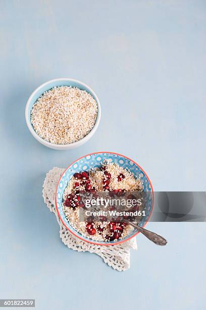 bowl of natural yoghurt with amarant and pomegranate seed - amarant stock pictures, royalty-free photos & images