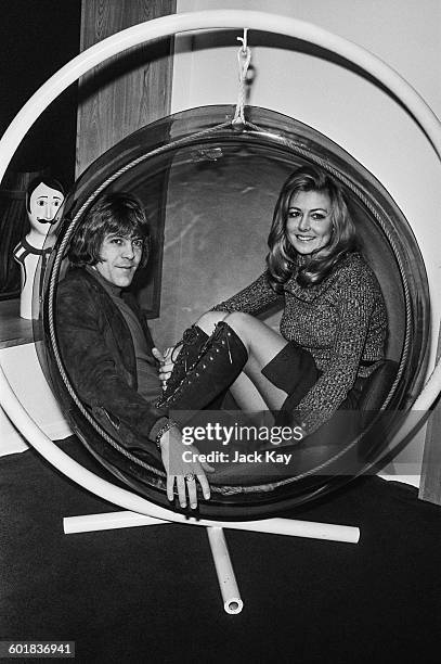 Pop singer Dave Dee and his fiancee Carol Dunning shopping for furniture, UK, 31st December 1970.