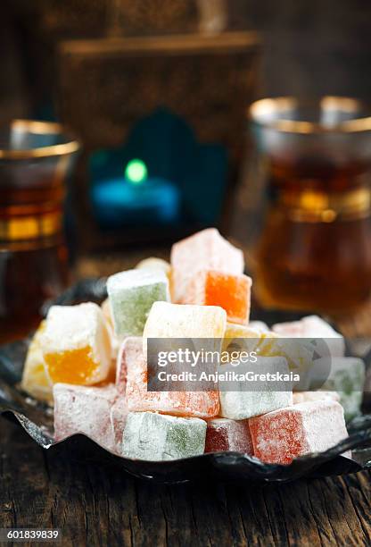 dish of turkish delight sweets - turkish delight stock-fotos und bilder