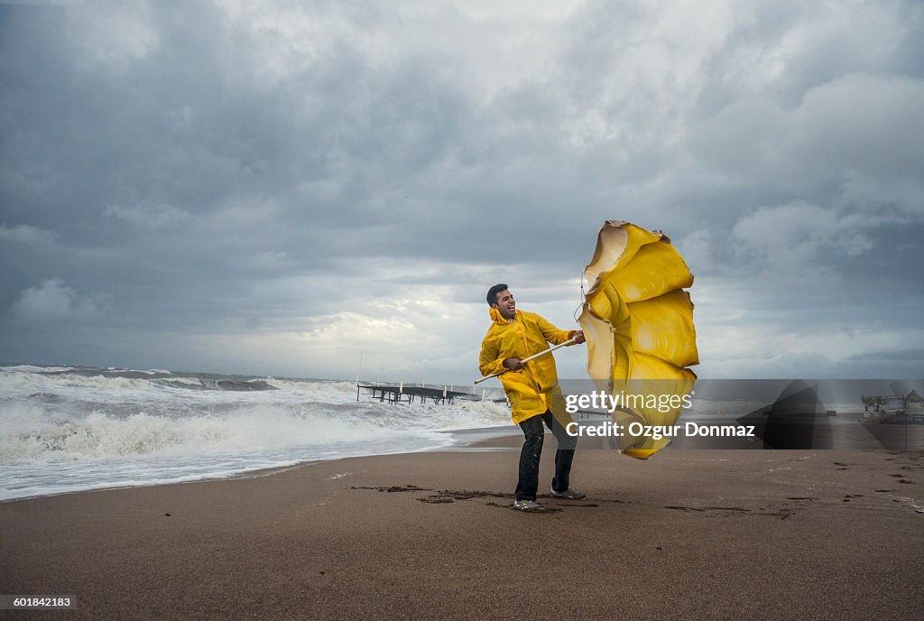 Man on windy beach