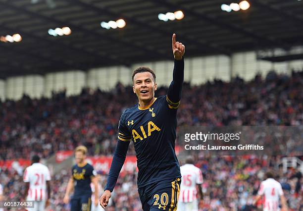 Dele Alli of Tottenham Hotspur celebrates scoring his sides third goal during the Premier League match between Stoke City and Tottenham Hotspur at...