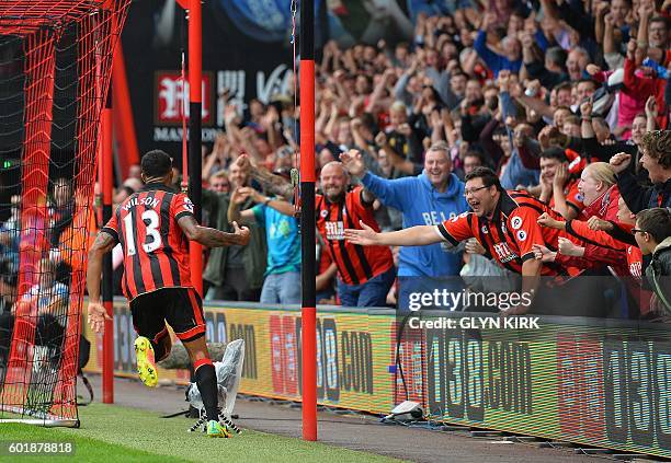 Bournemouth's English striker Callum Wilson celebrates scoring his team's first goal during the English Premier League football match between...