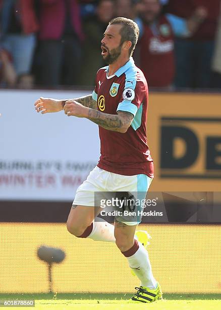 Steven Defour of Burnley celebrates scoring his sides first goal during the Premier League match between Burnley and Hull City at Turf Moor on...