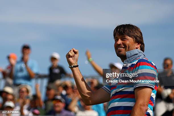 Former professional golfer Robert-Jan Derksen of the Netherlands celebrates on the 14th tee during the third round on day three of the KLM Open at...