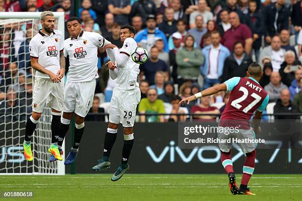 Dimitri Payet of West Ham United takes a freekick during the Premier League match between West Ham United and Watford at Olympic Stadium on September...