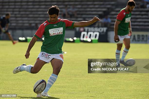 Bayonne's Argentinian fullback Martin Bustos Moyano kicks the ball during the warm up ahead of the French Top 14 rugby union match between...