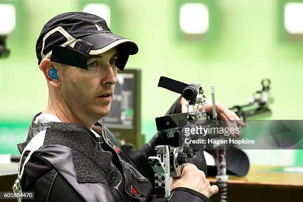 Michael Johnson of New Zealand competes in the R4 Mixed 10m Air Rifle Standing SH2 qualification round on day 3 of the Rio 2016 Paralympic Games at...
