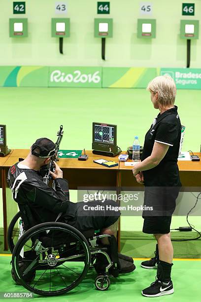 Michael Johnson of New Zealand competes in the R4 Mixed 10m Air Rifle Standing SH2 qualification round on day 3 of the Rio 2016 Paralympic Games at...