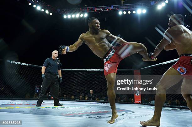 Demarques Jackson fight Raush Manfio in their Lightweight bout during the TITAN FC41 UFC fight event at Bank United Center on September 9, 2016 in...