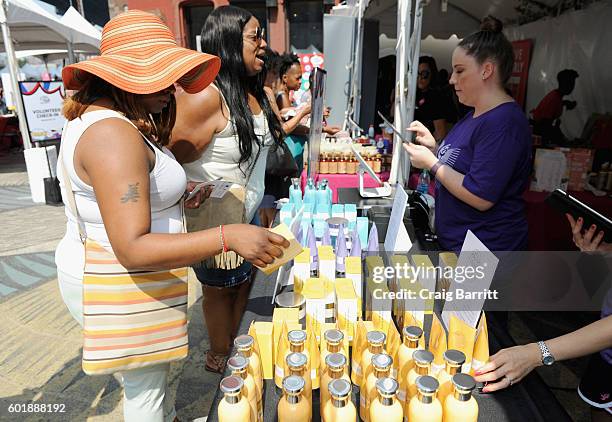 View of the Madam C.J. Walker Beauty Culture booth during the 2016 Essence Street Style Block Party at DUMBO on September 10, 2016 in Brooklyn...