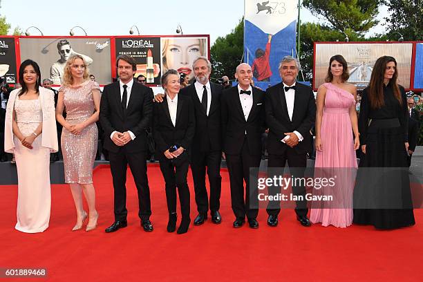 Zhao Wei wears a Jaeger-LeCoultre watch on the red carpet with other member of the Jury Nina Hoss, Lorenzo Vigas, Laurie Anderson, president of the...