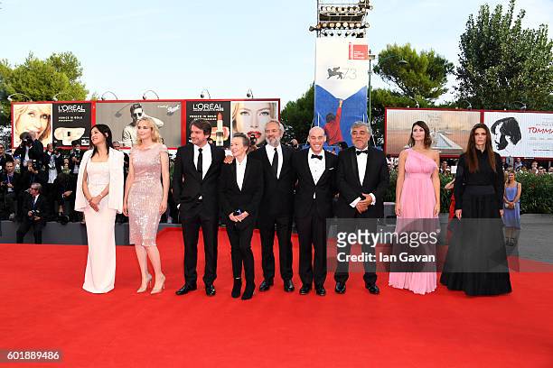 Zhao Wei wears a Jaeger-LeCoultre watch on the red carpet with other member of the Jury Nina Hoss, Lorenzo Vigas, Laurie Anderson, president of the...