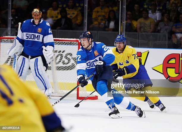 Ville Pokka of Finland and Patric Hornqvist of Sweden during the Pre World Cup of Hockey match between Sweden and Finland at Scandinavium on...