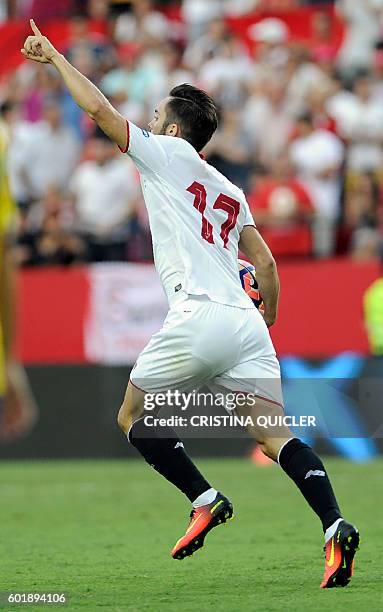 Sevilla's midfielder Pablo Sarabia celebrates after scoring a goal during the Spanish league football match Sevilla FC vs UD Las Palmas at the Ramon...