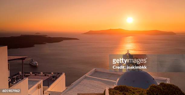 summer sunset in santorini island in greece - firak stock pictures, royalty-free photos & images