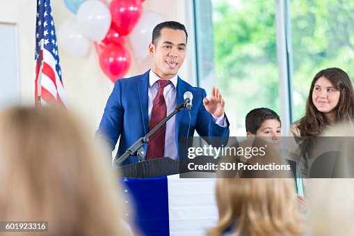 Candidate for city government answering questions during speech