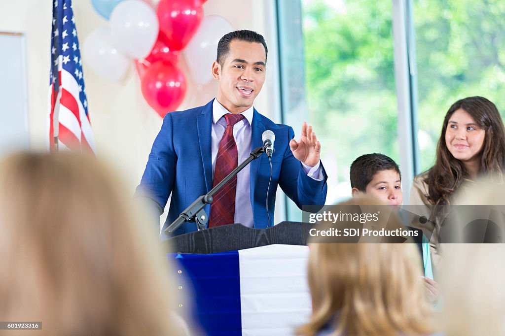 Candidate for city government answering questions during speech