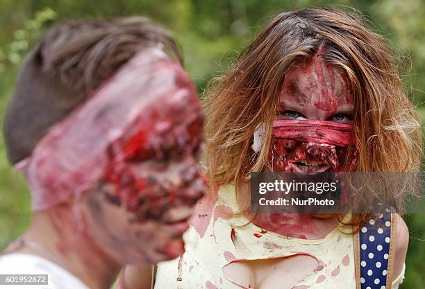 Ukrainians dressed up as zombies take part in a &quot;Zombie walk 2016&quot; in downtown Kiev,Ukraine,10 September,2016.