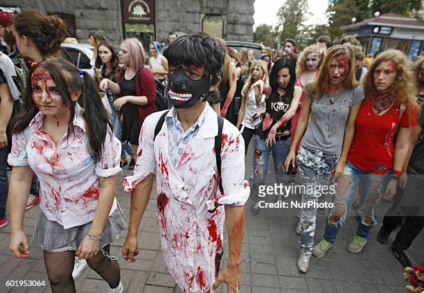 Ukrainians dressed up as zombies take part in a &quot;Zombie walk 2016&quot; in downtown Kiev,Ukraine,10 September,2016.