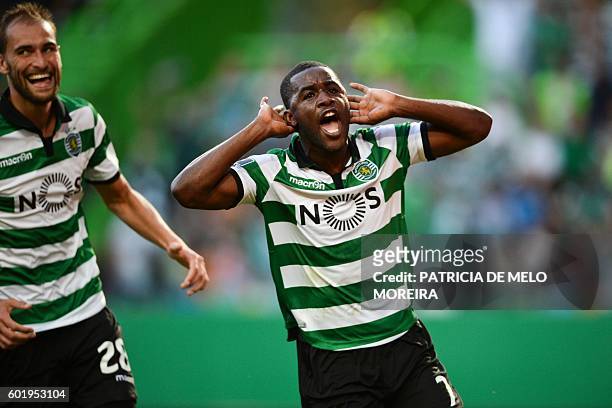 Sporting's Costa Rican forward Joel Campbell celebrates a goal beside teammate Sporting's Dutch forward Bas Dost during the Portuguese league...