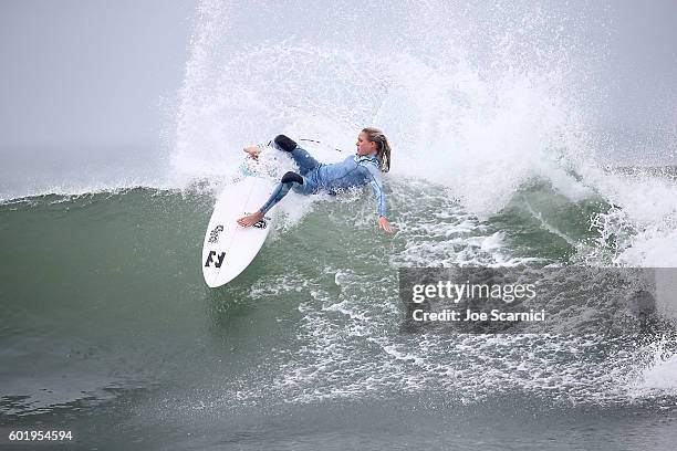 Laura Enever of Australia falls on her back on a wave during a free surf at the 2016 Hurley Pro at Trestles at San Onofre State Beach on September...