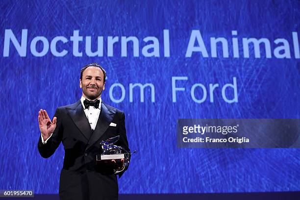 Director Tom Ford receives the silver Lion for his movie 'Nocturnal Animal' during the closing ceremony of the 73rd Venice Film Festival at Sala...