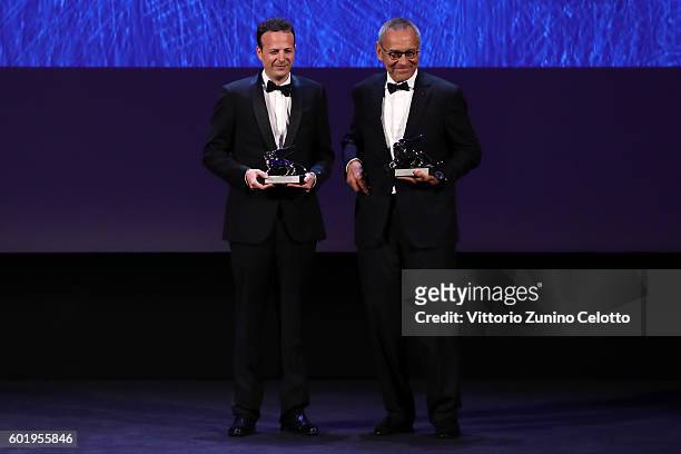 Directors Andrei Konchalovsky and Amat Escalante pose with the Silver Lions for Best Director for 'Paradise' and for 'The Untamed' during the closing...