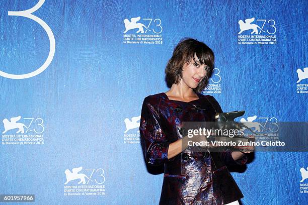 Director Ana Lily Amirpour poses with the Special Jury Prize for 'The Bad Batch' during the award winners photocall during the 73rd Venice Film...