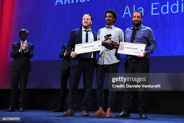 Director Ala Eddine Slim and actor Jawher Soudani receive the Lion of the Future 'Luigi de Laurentiis' Venice award for the movie 'The Last of Us'...