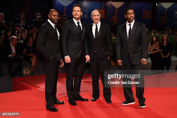 Director and executive producer Antoine Fuqua, actor Chris Pratt, Walter Mirisch and Actor Denzel Washington attend the premiere of "The Magnificent...