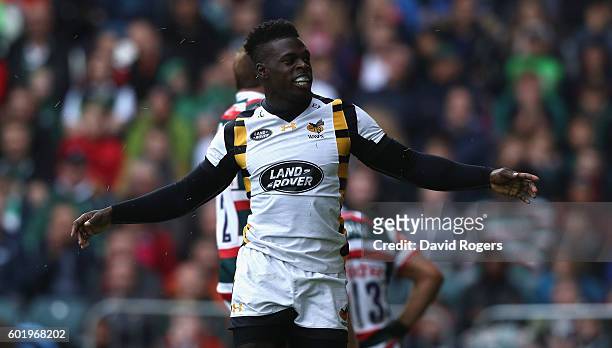 Christian Wade of Wasps celebrates after scoring the first try of the match during the Aviva Premiership match between Leicester Tigers and Wasps at...