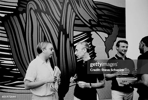 American curator and historian Henry Geldzahler speaks with art dealer and gallery owner Leo Castelli at the Venice Biennale, Venice, Italy, 1966. In...