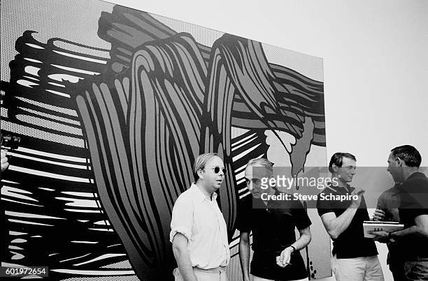 American curator and historian Henry Geldzahler speaks with art dealer and gallery owner Leo Castelli at the Venice Biennale, Venice, Italy, 1966. In...