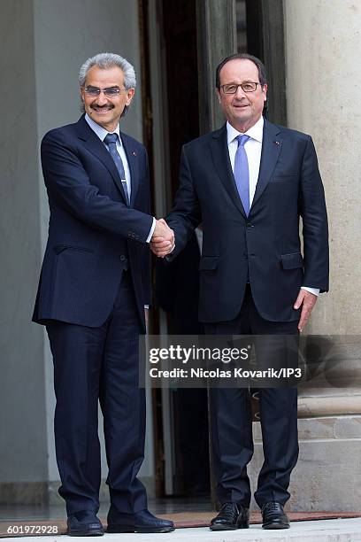 French President Francois Hollande hosts Saudi Prince AlWaleed bin Talal bin Abdulaziz Al Saoud for a meeting at the Elysee Palace on September 8,...