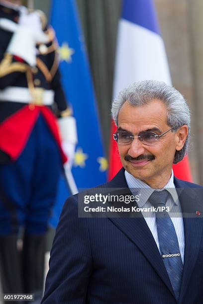 Saudi Prince AlWaleed bin Talal bin Abdulaziz Al Saoud arrives to meet French President Francois Hollande at the Elysee Palace on September 8, 2016...