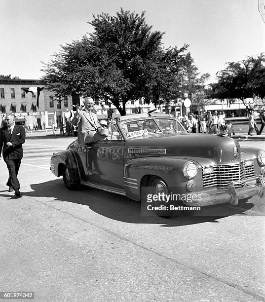Democratic vice-presidential candidate, Senator Harry S. Truman arrives in crowded Lamar, Missouri, to recieve the welcome of thousands of folk come...
