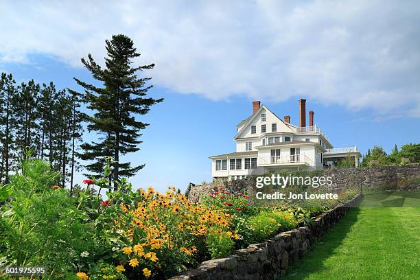 grand mansion on a hill - moosehead lake stock-fotos und bilder